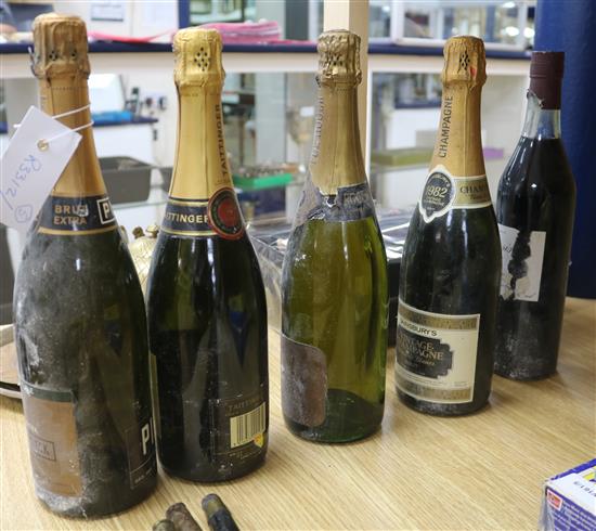 Four bottles of mixed champagnes and one bottle of Creme de Cassis